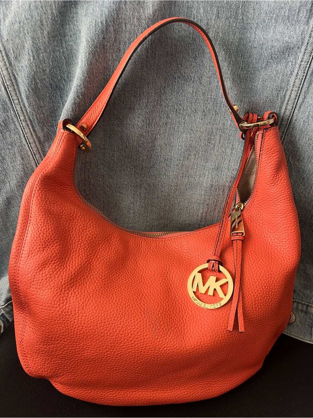 Michael Kors Coral-Orange Pebbled Leather Hobo with Gold MK Charm